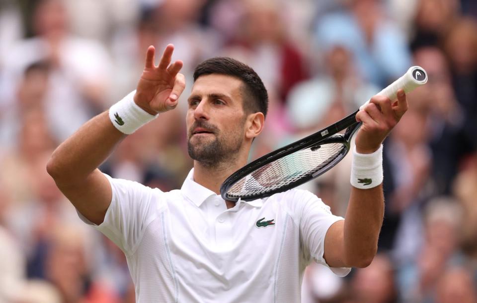 Novak Djokovic celebrates on match point after beating Lorenzo Musetti  (Getty Images)