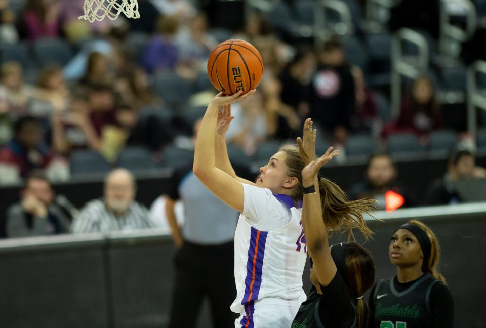 Evansville’s Abby Feit (14) takes a shot as the University of Evansville Purple Aces play the Chicago State Cougars at Ford Center in Downtown Evansville, Ind., Wednesday afternoon, Nov. 16, 2022. 