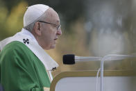 Pope Francis delivers his message as he celebrates Mass at the Santakos Park, in Kaunas, Lithuania, Sunday, Sept. 23, 2018. Francis paid tribute Sunday to Lithuanians who suffered and died during Soviet and Nazi occupations on the day the country remembers the near-extermination of its centuries-old Jewish community during the Holocaust. (AP Photo/Andrew Medichini)