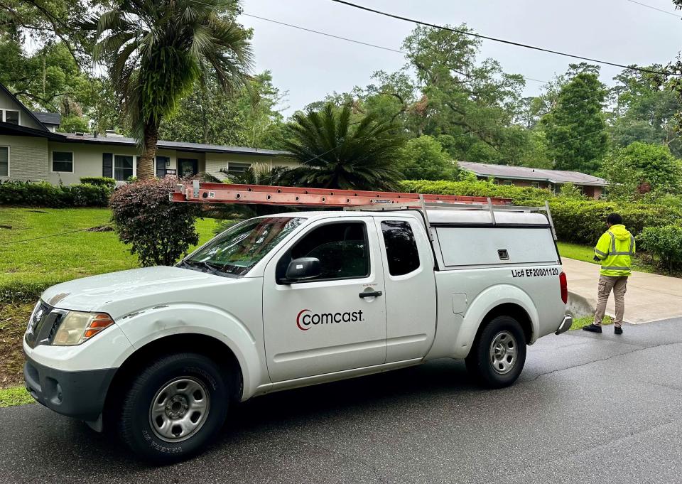 Comcast trucks and personnel worked to restore service Friday, May 17, 2024, in Indianhead Acres, which was heavily damaged in the May 10 tornado outbreak.