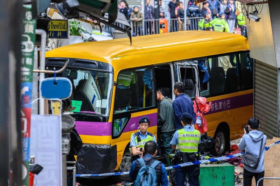 The bus, which had been parked outside North Point Methodist Primary School, mounted a pavement (AFP/Getty Images)