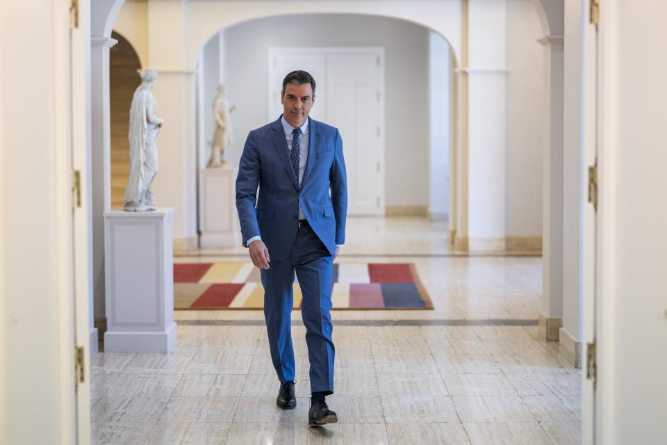 Spain's Prime Minister Pedro Sanchez arrives for an interview with The Associated Press at the Moncloa Palace in Madrid, Spain, Monday, June 27, 2022. (AP Photo/Bernat Armangue)