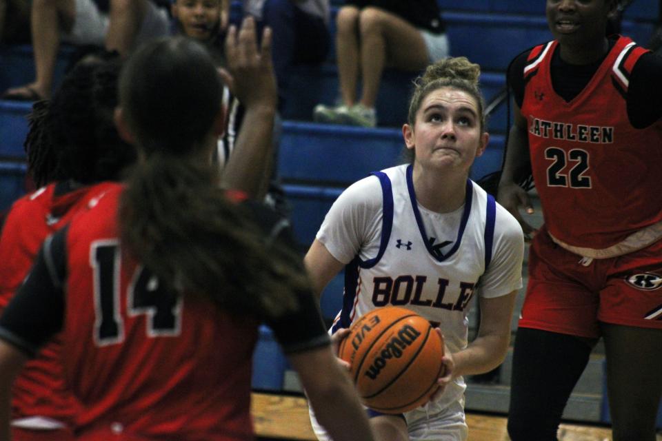 Bolles guard Ella Stakem (4) goes up for a shot against the Kathleen defense during Monday morning's Insider Exposure Thanksgiving Classic girls basketball game.