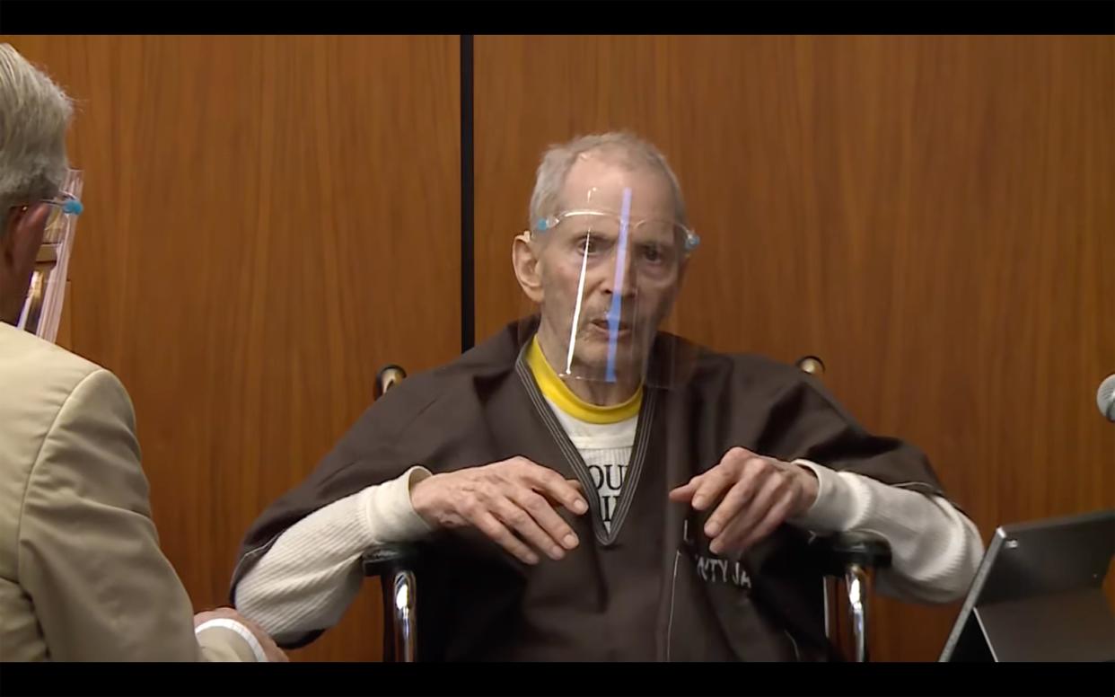 Robert Durst answers questions while taking the stand during his murder trial on Monday in Inglewood, Calif. 