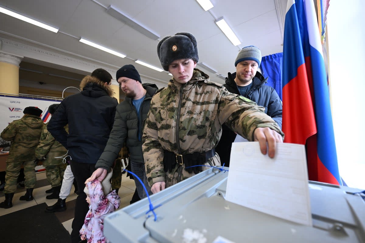 Votes being cast in Moscow. There is no doubt that Vladimir Putin will be declared the winner (AFP via Getty Images)