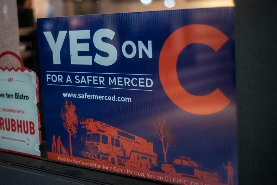 A sign promoting Measure C in a front window of Five Ten Bistro in Merced, Calif., on Tuesday, March 5, 2024.
