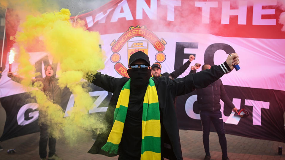 Manchester United fans are pictured here protesting the club's owners at Old Trafford. 