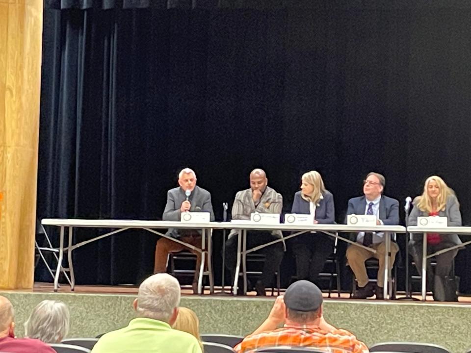 Incumbent County Executive Anthony J. Picente Jr. (left) addresses the audience at Meet the Candidates event.