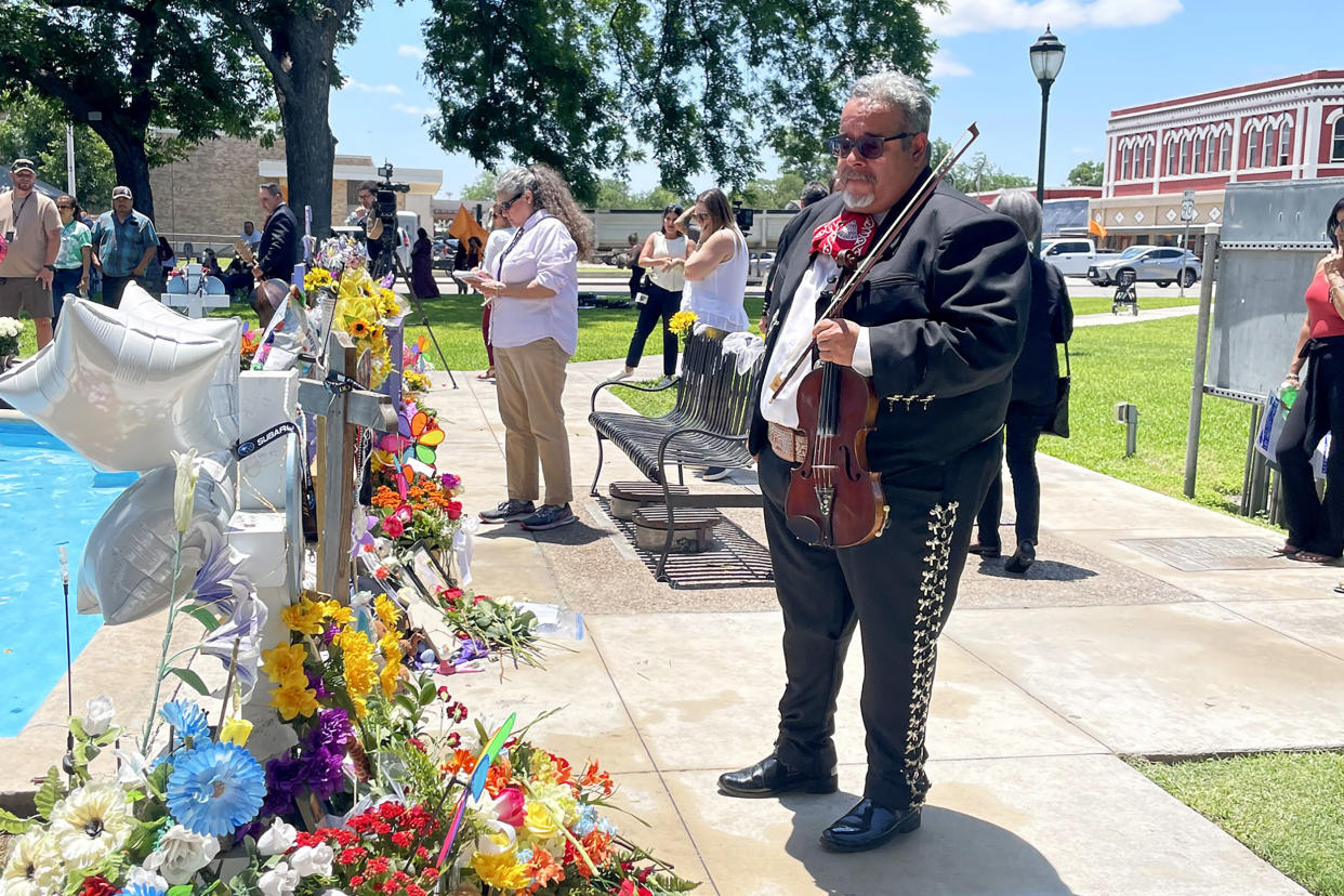 Mariachi musician Anthony Medrano said he wanted to give the grieving families a “musical embrace.” (Suzanne Gamboa / NBC News)