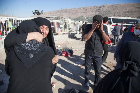 People react following an earthquake in Sarpol-e Zahab county in Kermanshah, Iran November 13, 2017. REUTERS/Tasnim News Agency