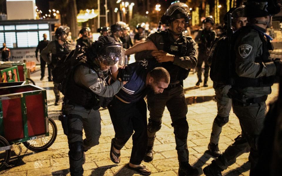 Israeli security forces arrest a man during a demonstration against the planned eviction process for the Palestinians in the Sheikh Jarrah neighbourhood - Avalon/Avalon