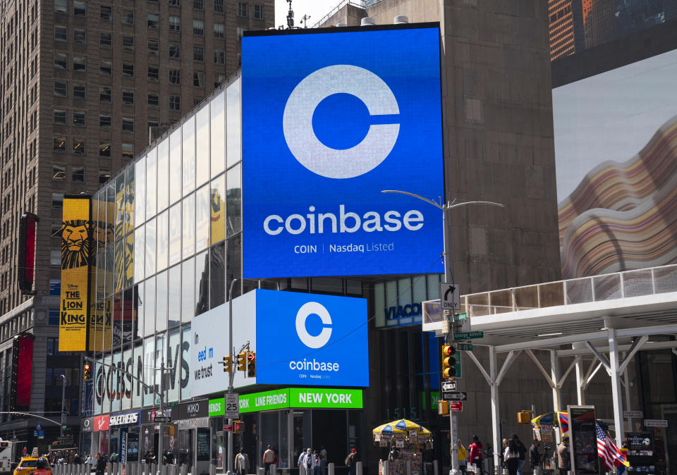 Monitors display Coinbase signage during the company's initial public offering (IPO) at the Nasdaq market site April 14, 2021 in New York City. (Photo by Robert Nickelsberg/Getty Images)