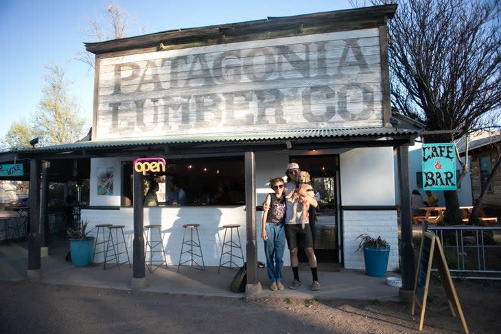 <span class="article__caption">Heidi, Zander, and Big Sky Ault in front of the Patagonia Lumber Co bar and cafe. </span> (Photo: Courtesy The Cyclist’s Menu)