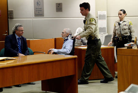 Robert Durst in a wheelchair arrives for his his arraignment on capital murder charges in the death of Susan Berman, with one of his lawyer David Z. Chesnoff (L) looking on, in Los Angeles, California, U.S. November 7, 2016. REUTERS/Kevork Djansezian