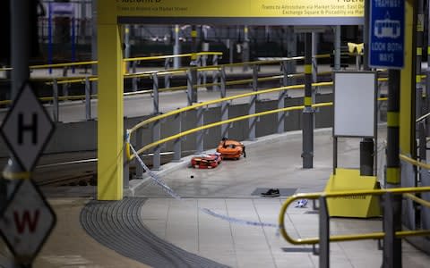 A discharged taser, shoe and paramedic equipment on Metrolink platform B at Victoria Station - Credit: Joel Goodman/LNP