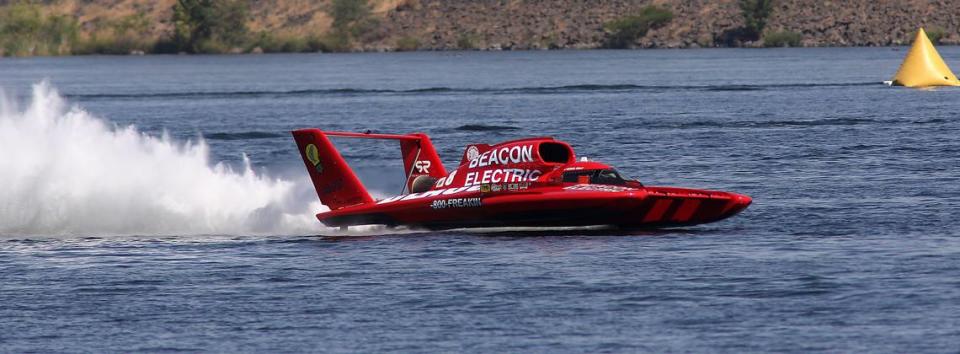 Driver J. Michael Kelly rockets around the Columbia River in the U-8 Beacon Electric unlimited hydroplane during testing for the Columbia Cup race in the Tri-Cities.