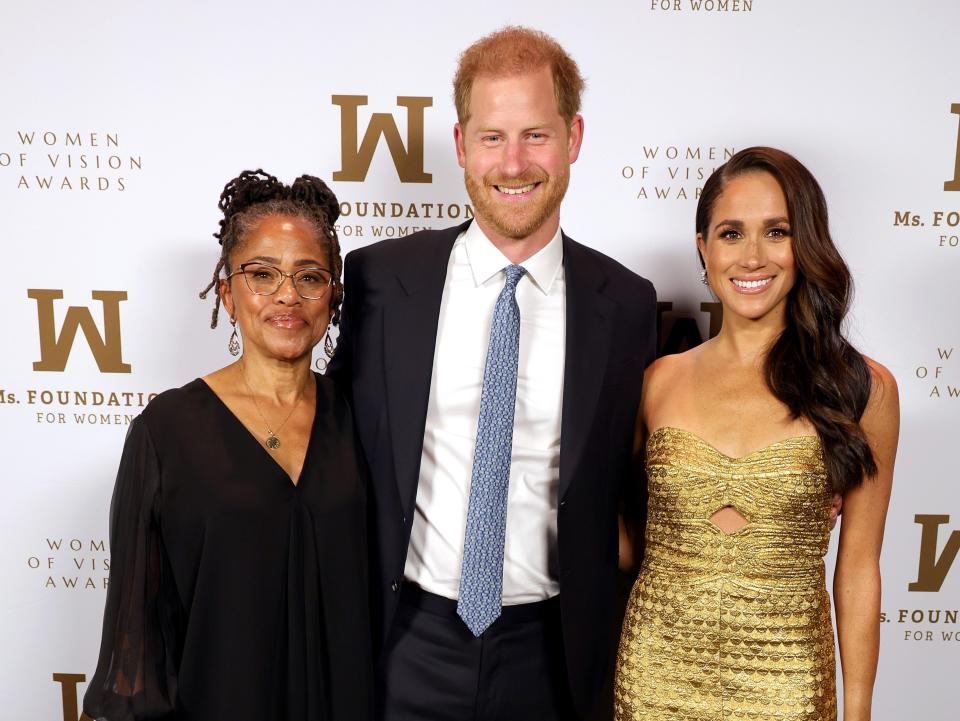 Doria Ragland, Prince Harry, and Meghan Markle.