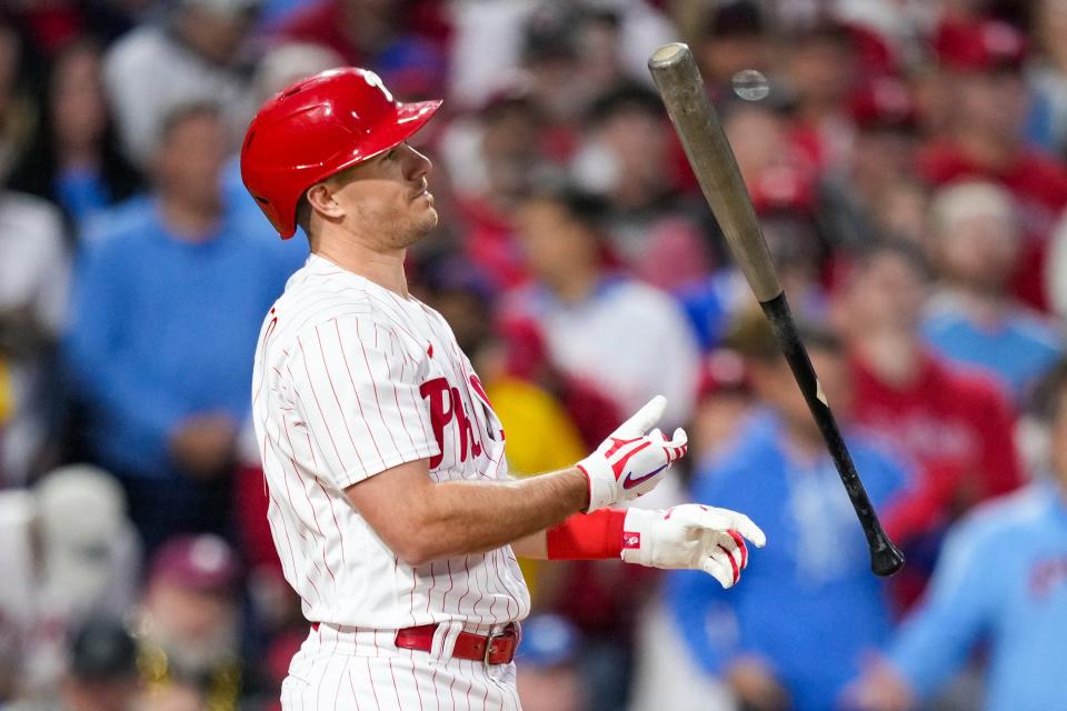 Philadelphia Phillies' J.T. Realmuto reacts after striking out against the Arizona Diamondbacks during the third inning in Game 6 of the baseball NL Championship Series in Philadelphia Monday, Oct. 23, 2023.