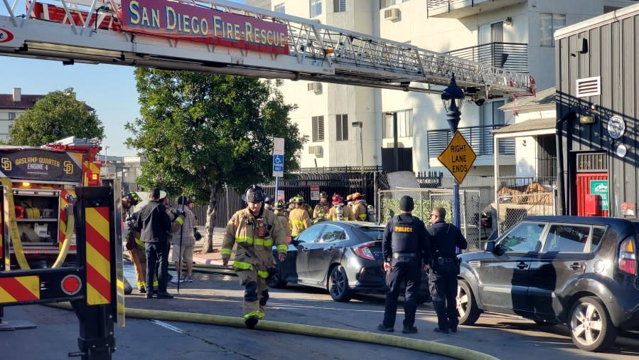 Firefighters at the scene of a fire in downtown San Diego on Feb. 13, 2024. (FOX 5)