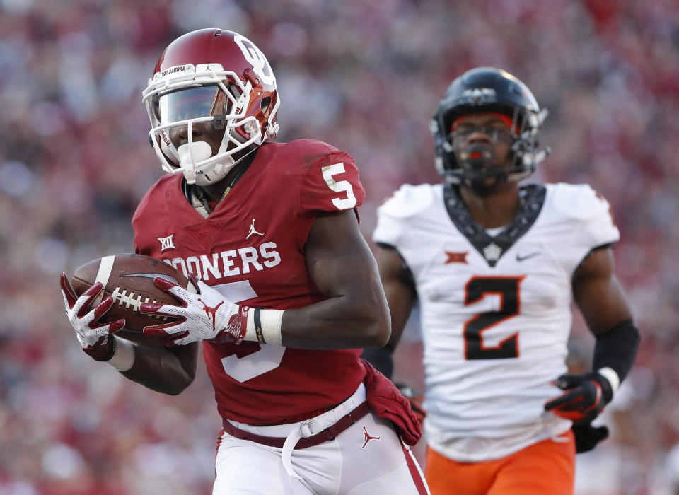 Oklahoma wide receiver Marquise Brown won't be able to work out at the NFL scouting combine. (AP)
