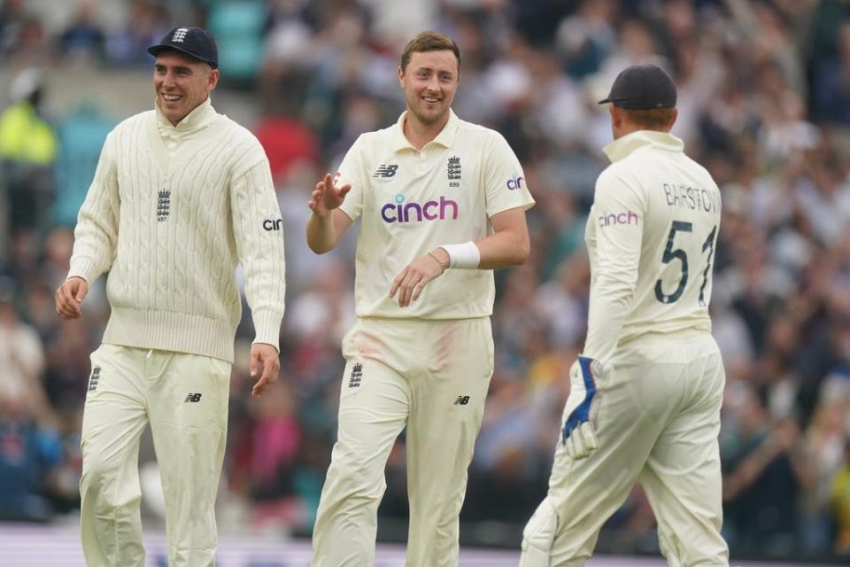 Ollie Robinson (centre) celebrates taking the wicket of India’s Rohit Sharma (Adam Davy/PA) (PA Wire)