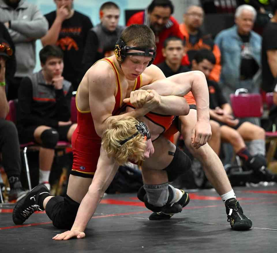 Oakdale’s Gideon Gerber put a Vacaville wrestler in a hold during the Sac-Joaquin Section team wrestling duals at Lincoln High School in Stockton, Calif., Saturday, Jan. 27, 2024.