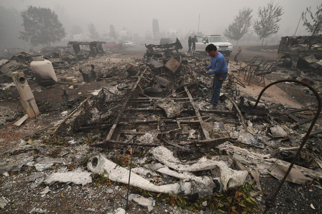 Marcelino Maceda looks at the ruins of his home in Estacada, Oregon (AFP via Getty Images)