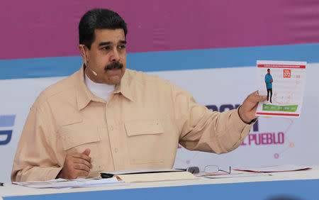 Venezuela's President Nicolas Maduro speaks during his weekly radio and TV broadcast "Los Domingos con Maduro" (The Sundays with Maduro) in Caracas, Venezuela, December 3, 2017. Miraflores Palace/Handout via REUTERS