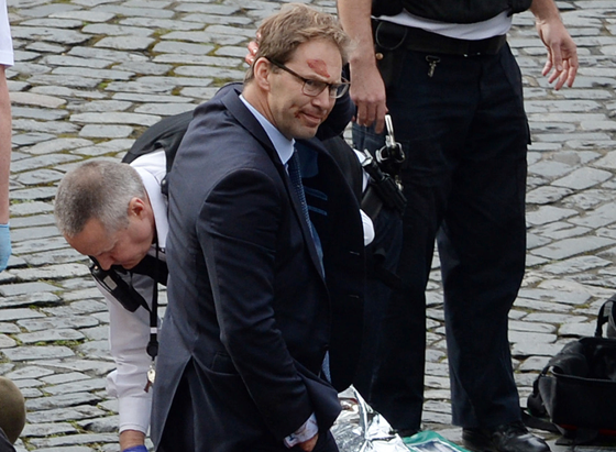 MP Tobias Ellwood pictured in the aftermath of the attack. (PA)