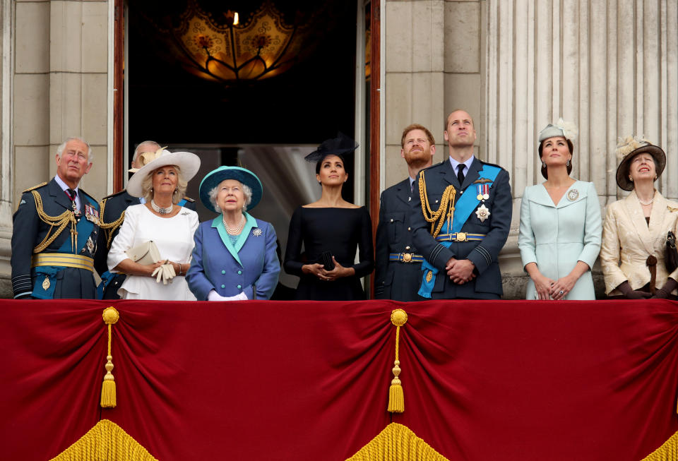 Britain's Prince Charles, Camilla, Duchess of Cornwall, Queen Elizabeth, Meghan, Duchess of Sussex, Prince Harry, Prince William, Catherine, Duchess of Cambridge and Princess Anne stand on the balcony of Buckingham Palace as they watch a fly past to mark the centenary of the Royal Air Force in central London, Britain July 10, 2018. REUTERS/Chris Radburn