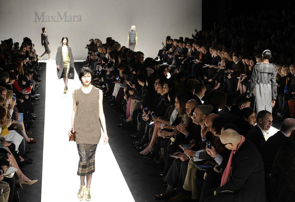 A model wears a creation for Max Mara women's Fall-Winter 2014-15 collection, part of the Milan Fashion Week, unveiled in Milan, Italy, Thursday, Feb.20, 2014. (AP Photo/Giuseppe Aresu)