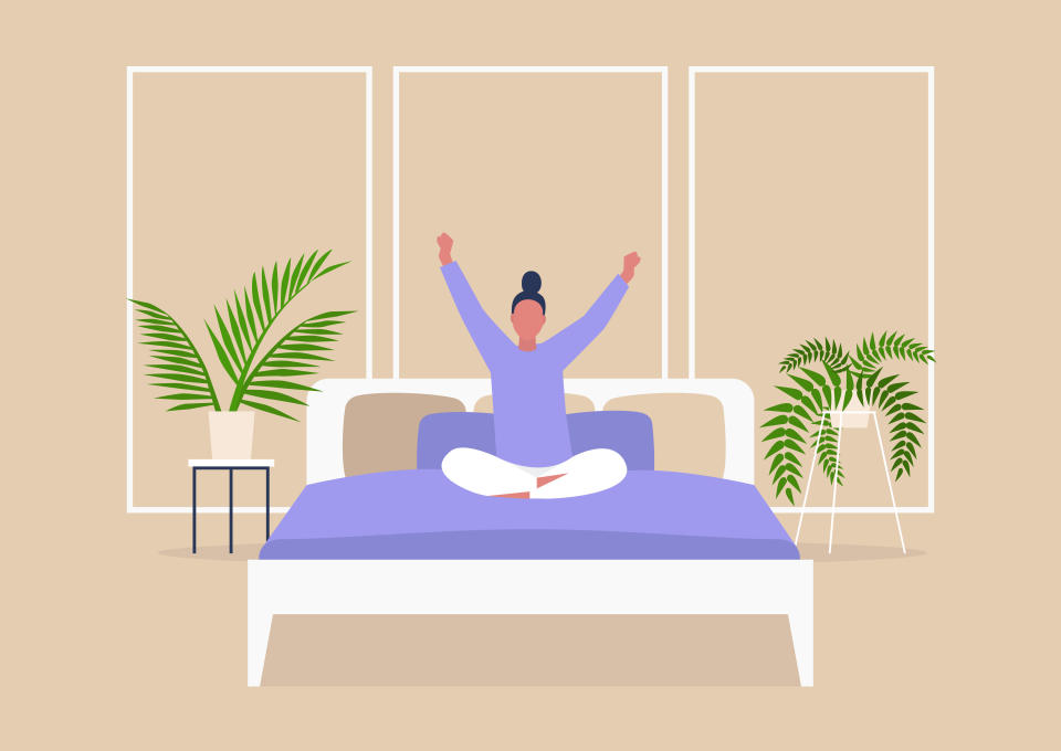Doing gentle stretches in the morning can help undo the damage caused by sitting at a desk all day and weird sleeping positions at night. (Photo: nadia_bormotova via Getty Images)