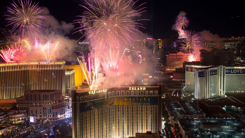 Fireworks are shot off the tops of Las Vegas hotels on January 1, 2018. - Richard Brian/Las Vegas Review-Journal/AP