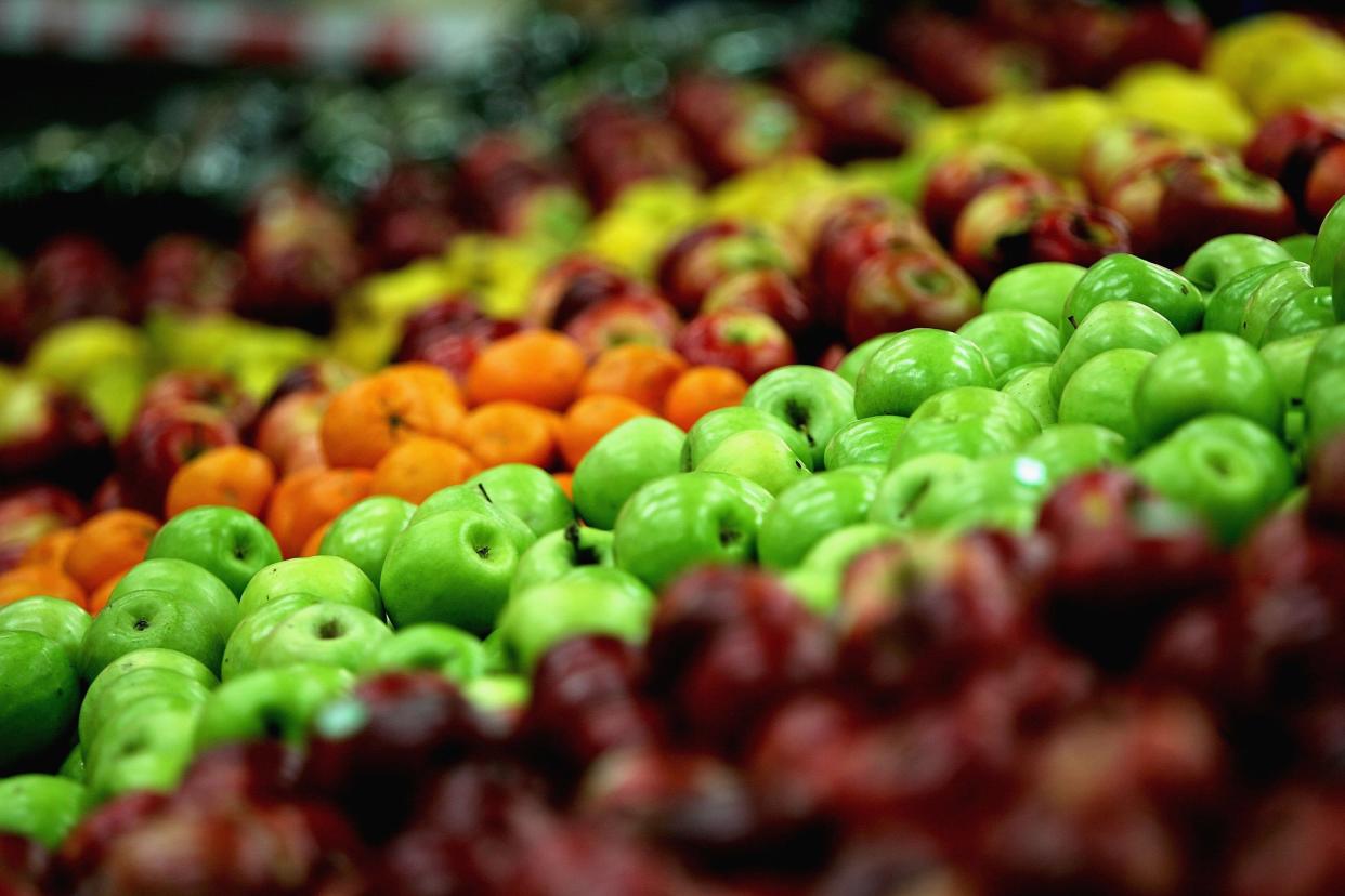 A supermarket shelf displays fresh fruit. Photo: Ian Waldie/Getty Images