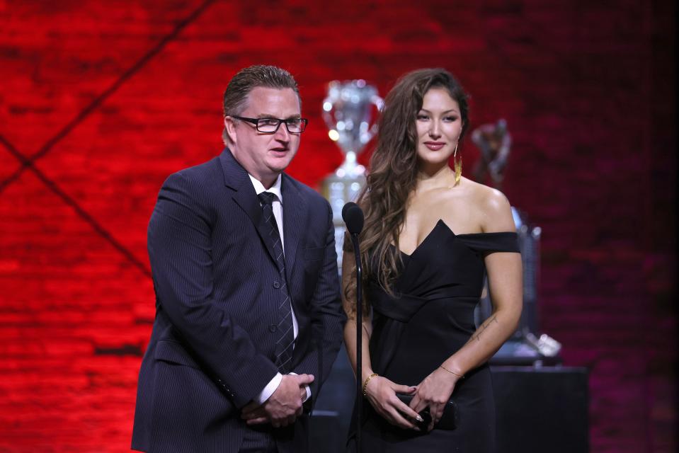 Assistant equipment manager Brian Hamilton of the Vancouver Canucks and Nadia Popovici presented the Hart Trophy at the 2022 NHL Awards Tuesday night in Tampa.