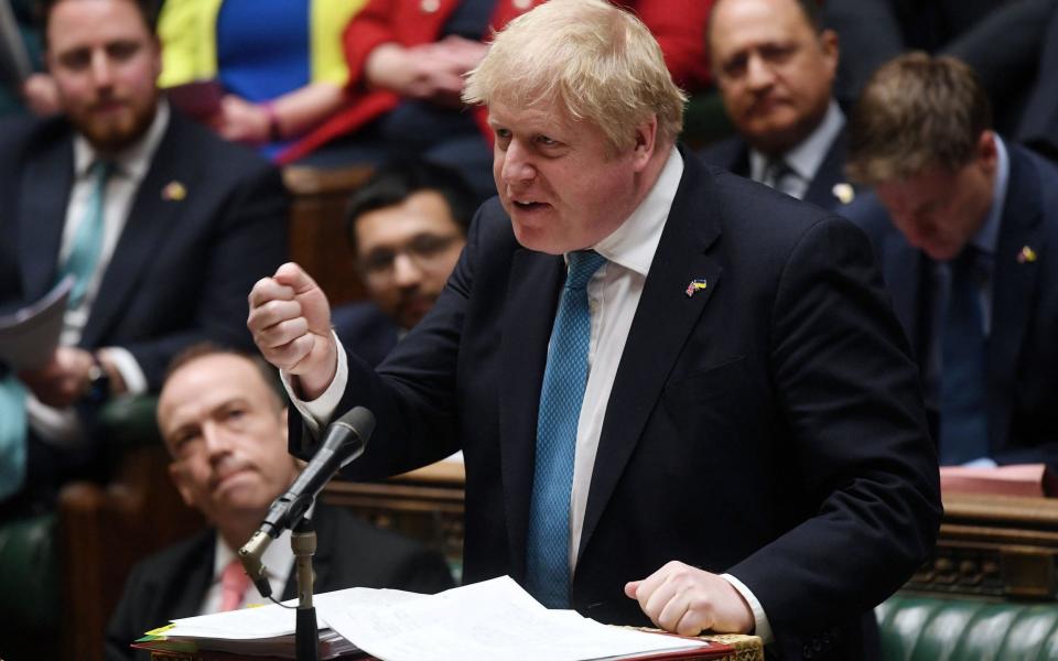 Britain's Prime Minister Boris Johnson speaking during a Prime Minister's Questions (PMQs) session in the House of Commons, in London - AFP
