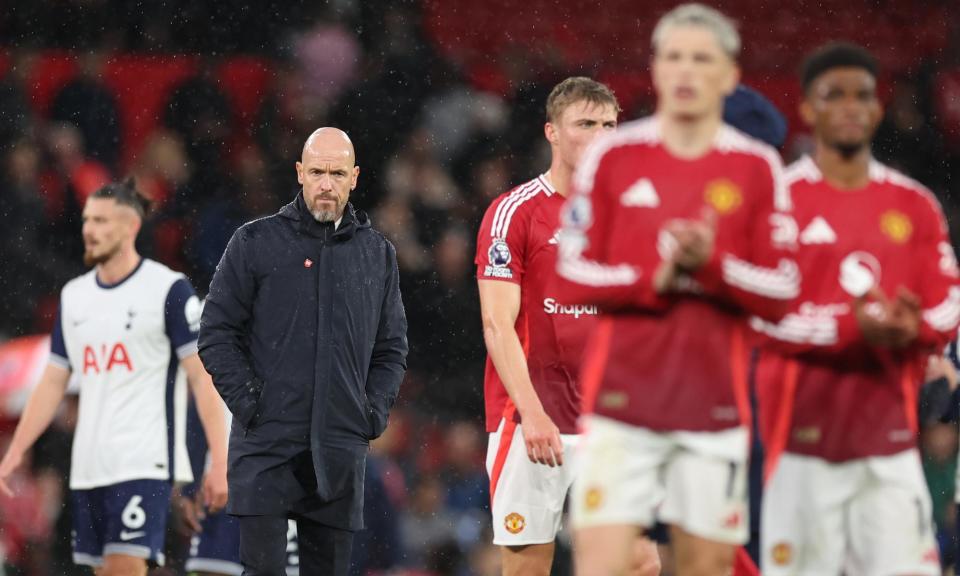 <span>Erik ten Hag (second from left) trudges off the field after Manchester United’s 3-0 loss to Tottenham.</span><span>Photograph: Catherine Ivill/AMA/Getty Images</span>