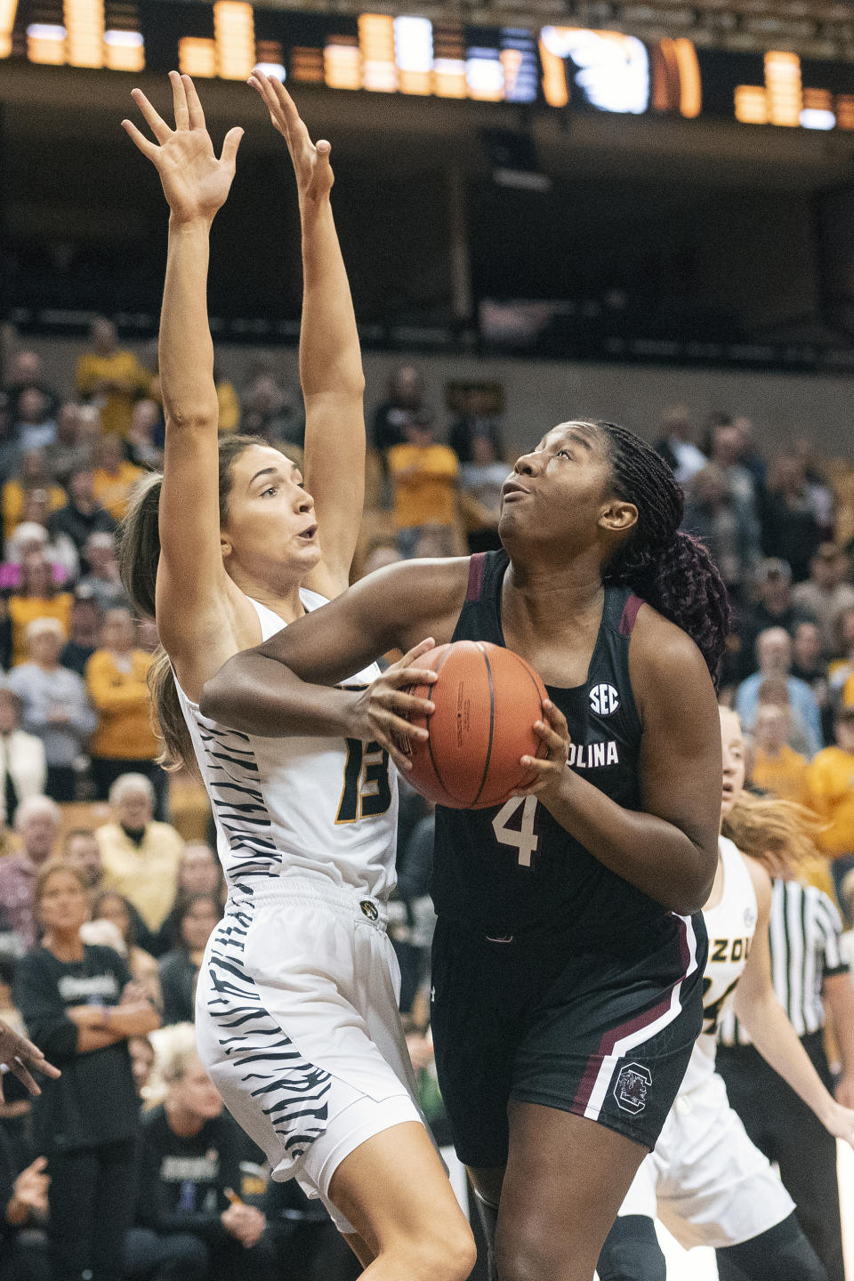 South Carolina's Aliyah Boston, right, shoots past Missouri's Hannah Schuchts, left, during the first half of an NCAA college basketball game Thursday, Jan. 16, 2020, in Columbia, Mo. (AP Photo/L.G. Patterson)