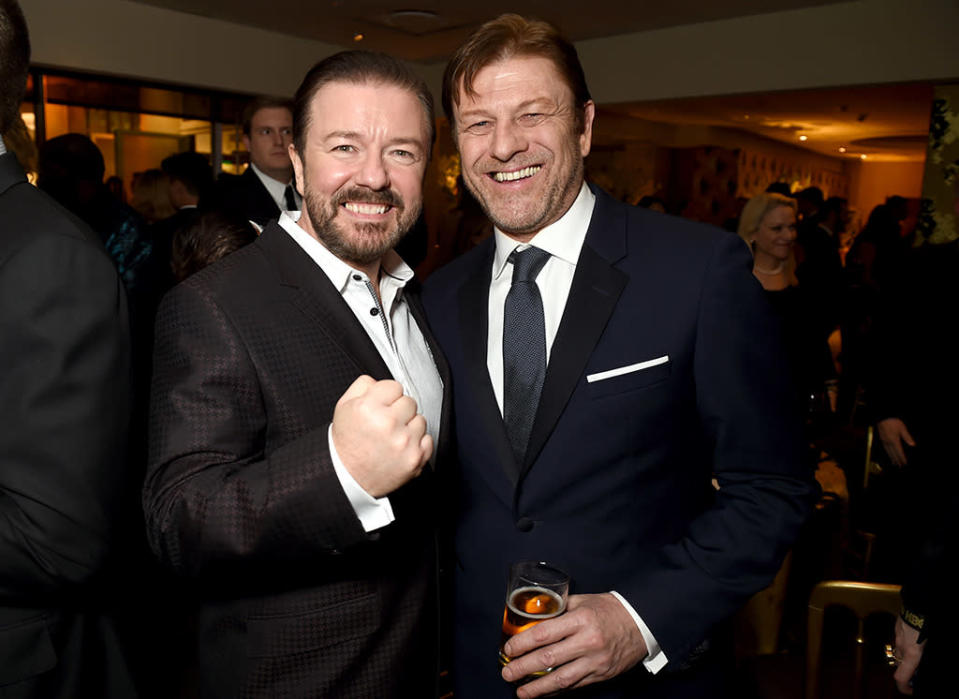 Sean Bean is clearly amused by Ricky Gervais’s impression of that creepy meme kid. (Photo: Getty Images)