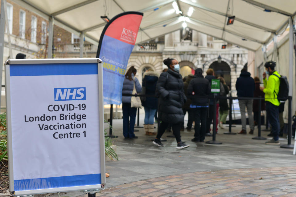 LONDON, UNITED KINGDOM - 2021/01/04: People queue at NHS Covid-19 vaccination centre in London as cases of the virus continue to soar. (Photo by Thomas Krych/SOPA Images/LightRocket via Getty Images)