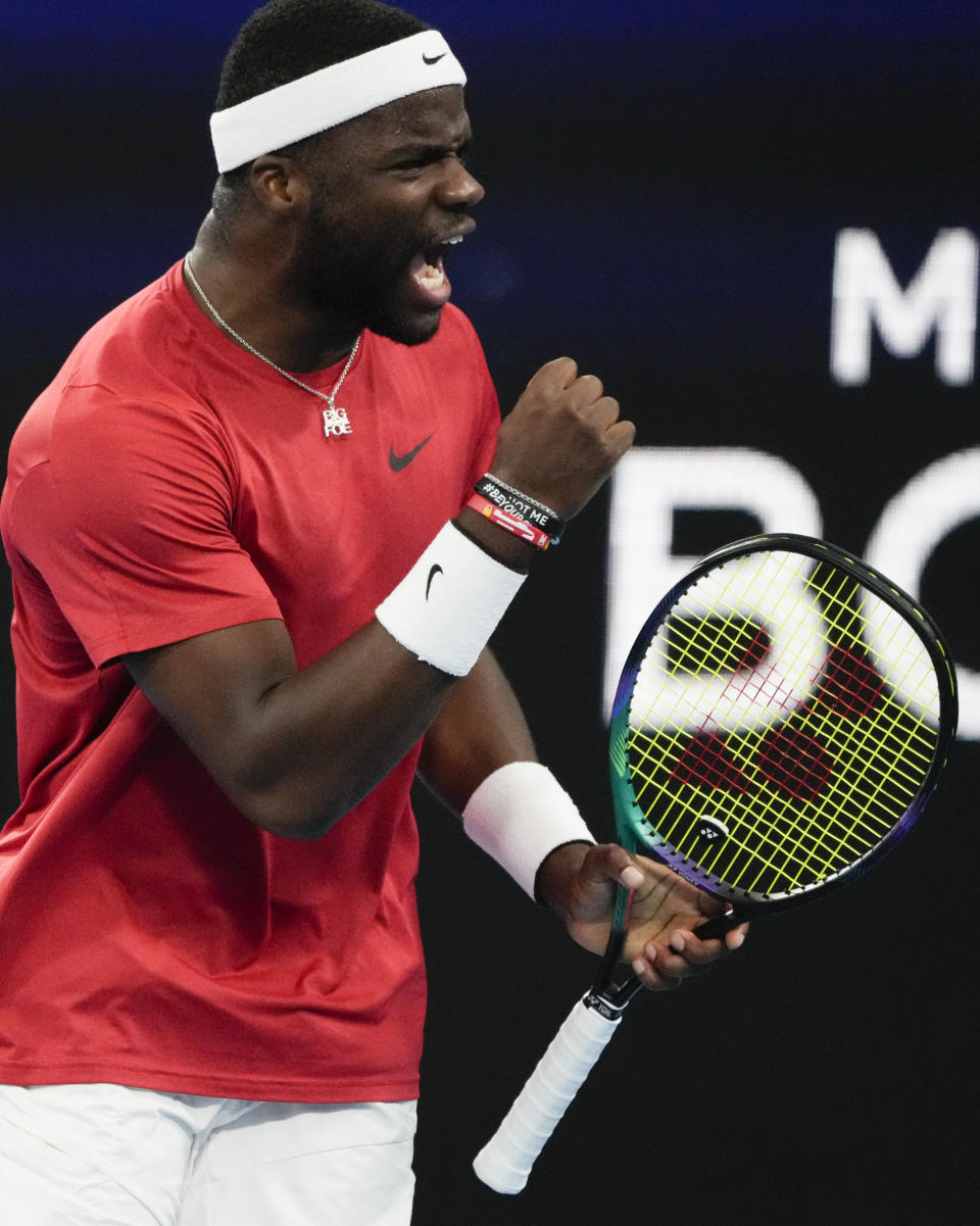 United States' Frances Tiafoe reacts after winning a point against Poland's Kacper Zuk during their semifinal match at the United Cup tennis event in Sydney, Australia, Friday, Jan. 6, 2023. (AP Photo/Mark Baker)