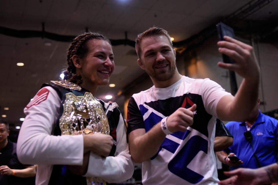 Miesha Tate celebrates with boyfriend Bryan Caraway backstage during the UFC 196 event inside MGM Grand Garden Arena on March 5, 2016 in Las Vegas, Nevada.  (Photo by Todd Lussier/Zuffa LLC/Zuffa LLC via Getty Images)