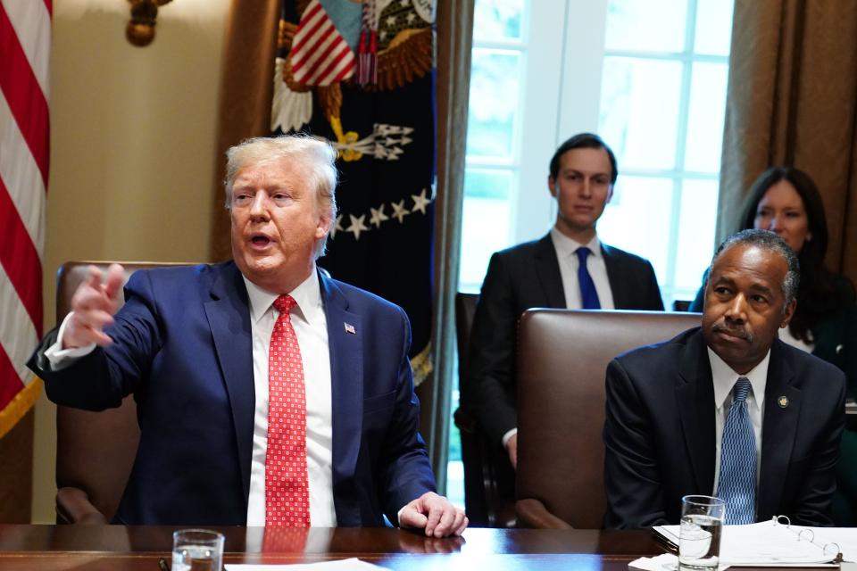 US President Donald Trump takes part in a cabinet meeting in the Cabinet Room of the White House in Washington, DC on November 19, 2019 as Ben Carson, Secretary of Housing and Urban Development looks on. (Photo by MANDEL NGAN / AFP) (Photo by MANDEL NGAN/AFP via Getty Images)