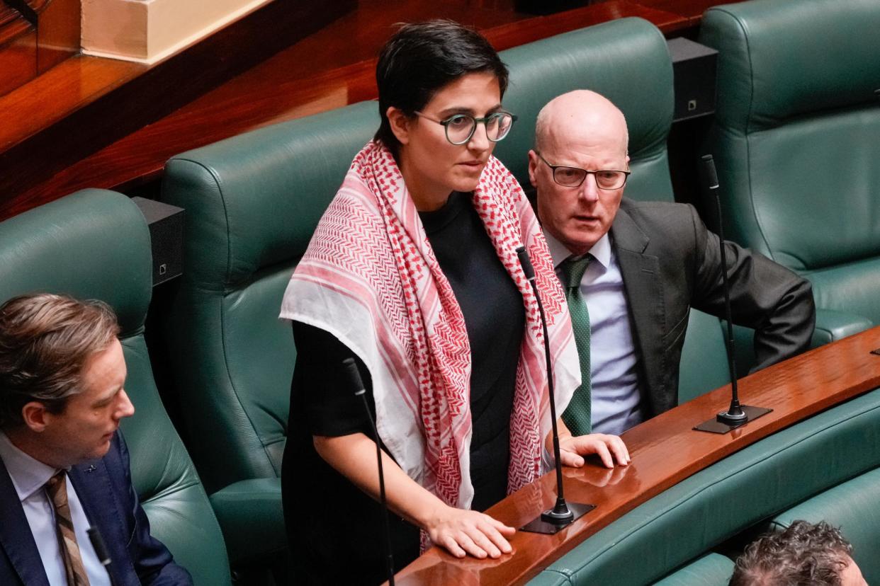 <span>Greens MP Gabrielle de Vietri after she was asked to leave the floor of Victorian parliament due to her wearing the keffiyeh on 7 May. The speaker and the upper house president ruled the scarf was political and therefore banned from being worn in parliament.</span><span>Photograph: Asanka Ratnayake/Getty Images</span>