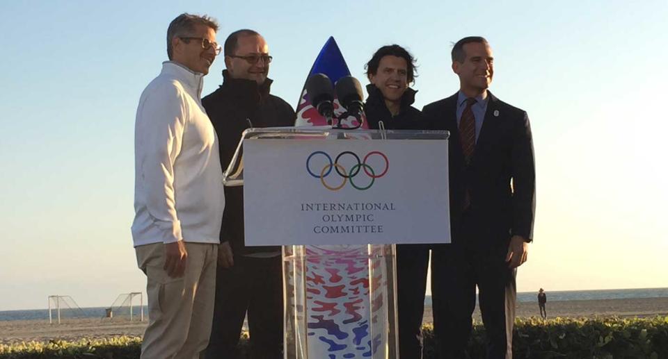 LA 2024 chairman Casey Wasserman, IOC members Patrick Baumann and Christophe Dubi, and L.A. Mayor Eric Garcetti