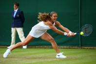 <p>Maria Sakkari of Greece plays a backhand during the Ladies Singles second round match against Venus Williams of The United States on day four of the Wimbledon Lawn Tennis Championships at the All England Lawn Tennis and Croquet Club on June 30, 2016 in London, England. (Photo by Jordan Mansfield/Getty Images)</p>