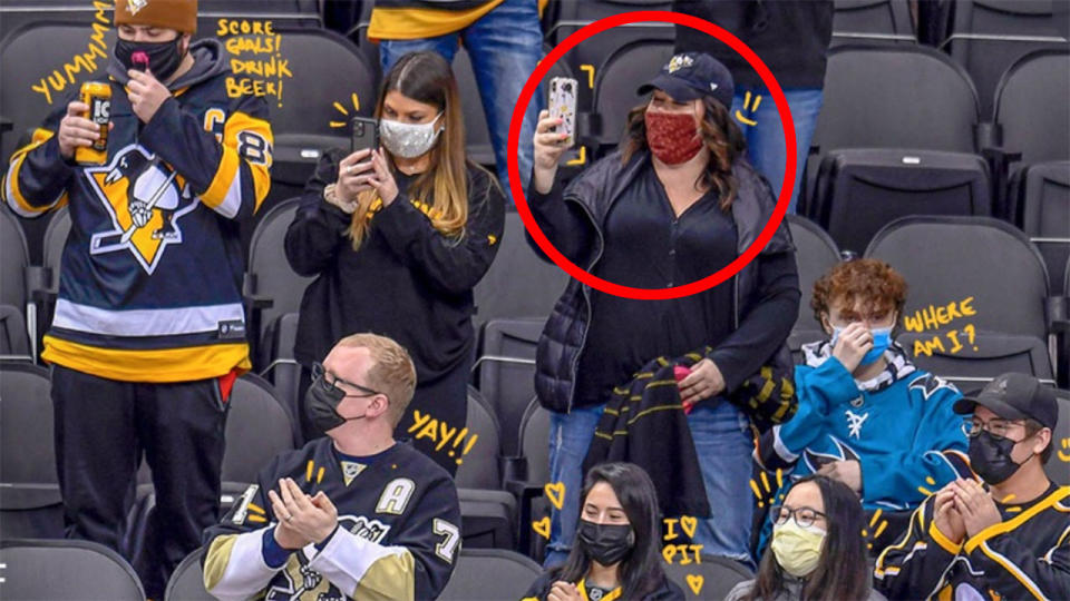 Seen here, one of the Pittsburgh Penguins fans whose face covering was photoshopped.