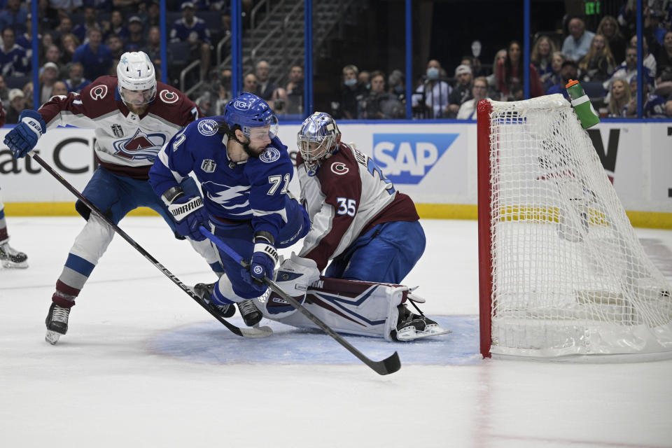 Tampa Bay Lightning center Anthony Cirelli (71) scores past Colorado Avalanche goaltender Darcy Kuemper (35) during the first period of Game 3 of the NHL hockey Stanley Cup Final on Monday, June 20, 2022, in Tampa, Fla. (AP Photo/Phelan M. Ebenhack)