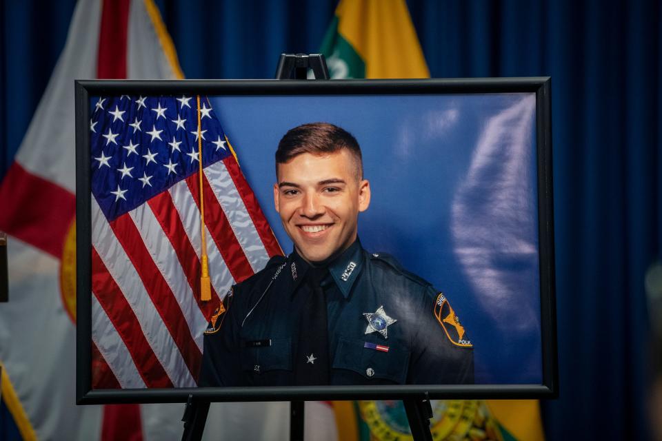 A poster of Polk County Deputy Blane Lane during a press conference at the Sheriffs Operation Center In Winter Haven Fl. Tuesday October 4,2022 Lane was fatally shot early Tuesday morning in Polk City when fellow deputies opened fire on the suspect  Williams who pointed a weapon at them.
Ernst Peters/.The Ledger