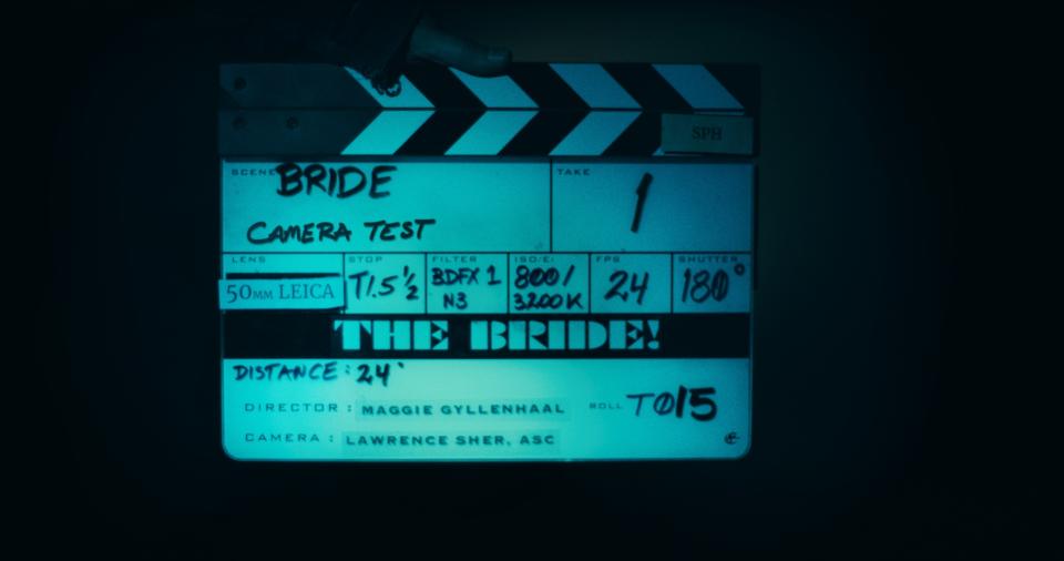 A clapperboard for a film titled "The Bride" with Maggie Gyllenhaal listed as the director